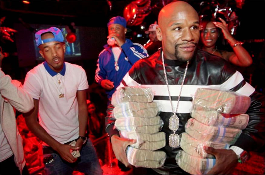 Floyd Mayweather presumiendo de billetes